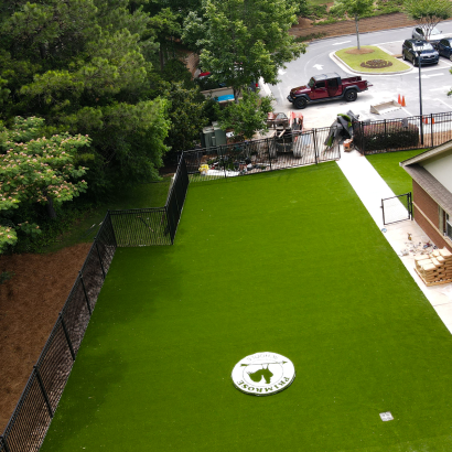 Artificial grass installation at Primrose Schools playground in shaded outdoor area Atlanta GA AST Ameriplay
