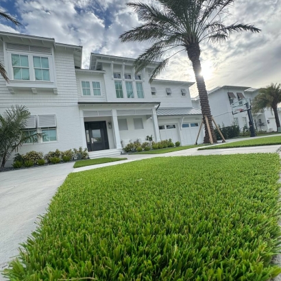Close-up view of Supreme 60 artificial turf installed in Tampa, Florida - lush green American Syn-Turf lawn for residential landscaping
