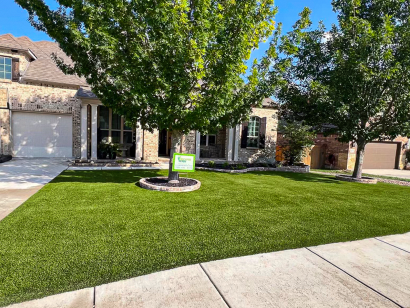Front yard artificial turf installation with AST Supreme-60 in San Antonio, TX under mature tree