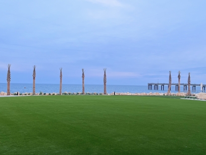 AmeriPlay. Embassy Suites courtyard. St. Augustine, FL. Synthetic turf grass installation, coast, beach, ocean